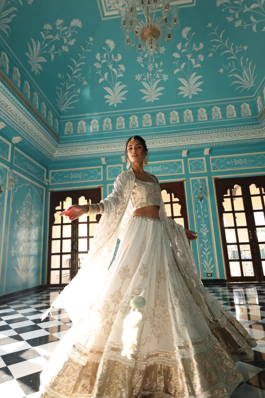 Ivory Creap Lehenga with Gokru Metal, Lampa & Sikhya Work