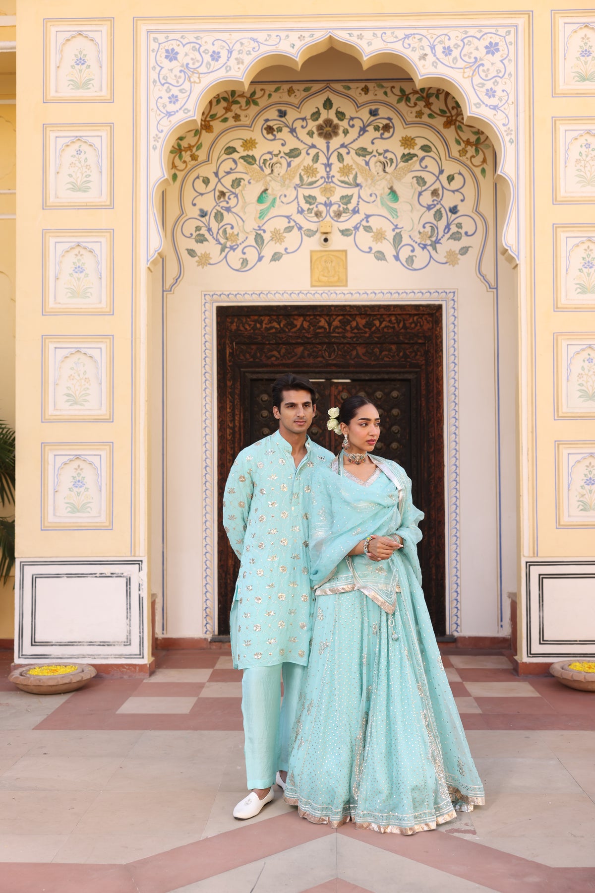 Ice Blue Couple Wear – Organza Lehenga & Men's Kurta Set with Traditional Mukesh Work