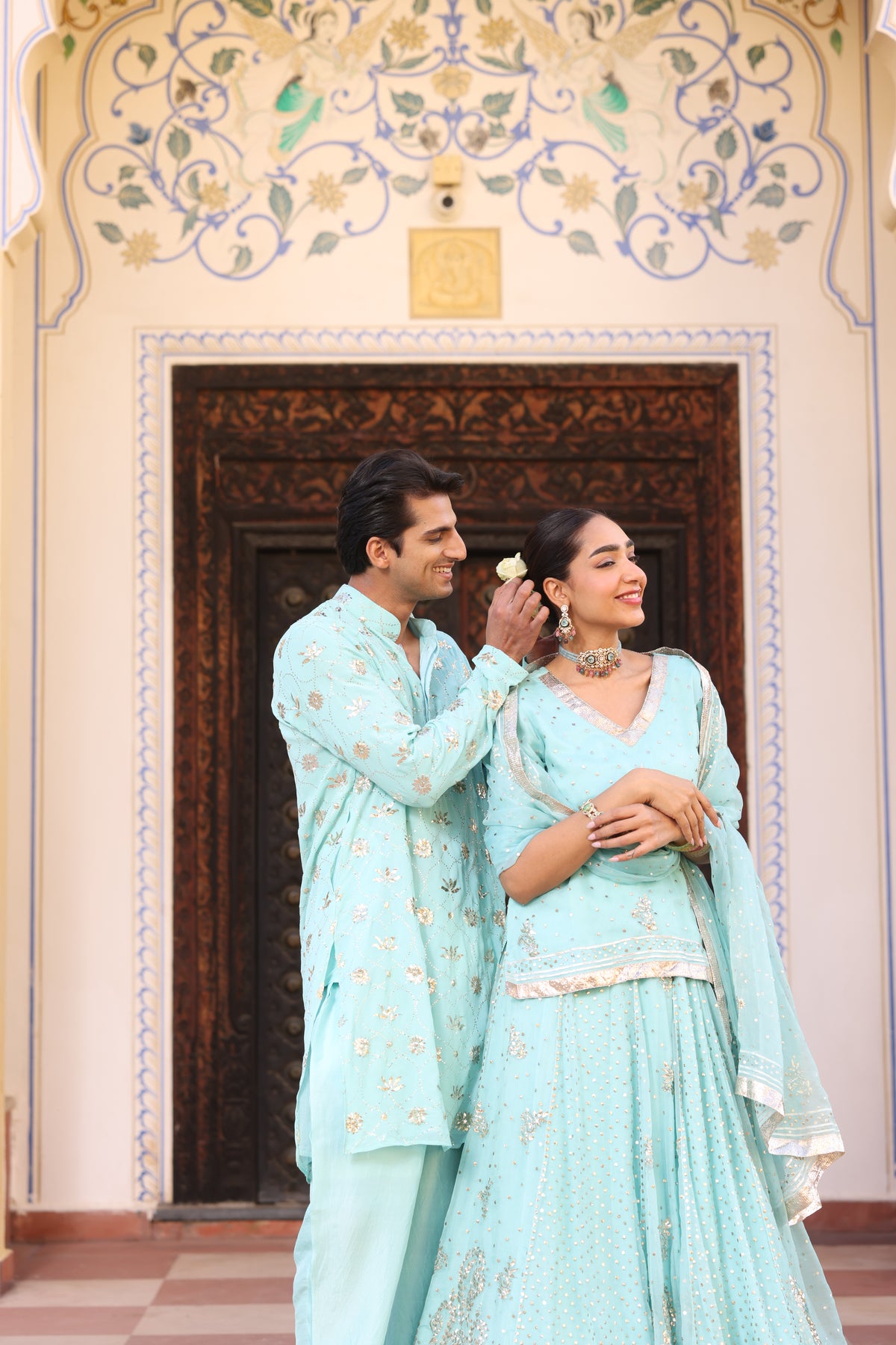 Ice Blue Couple Wear – Organza Lehenga & Men's Kurta Set with Traditional Mukesh Work