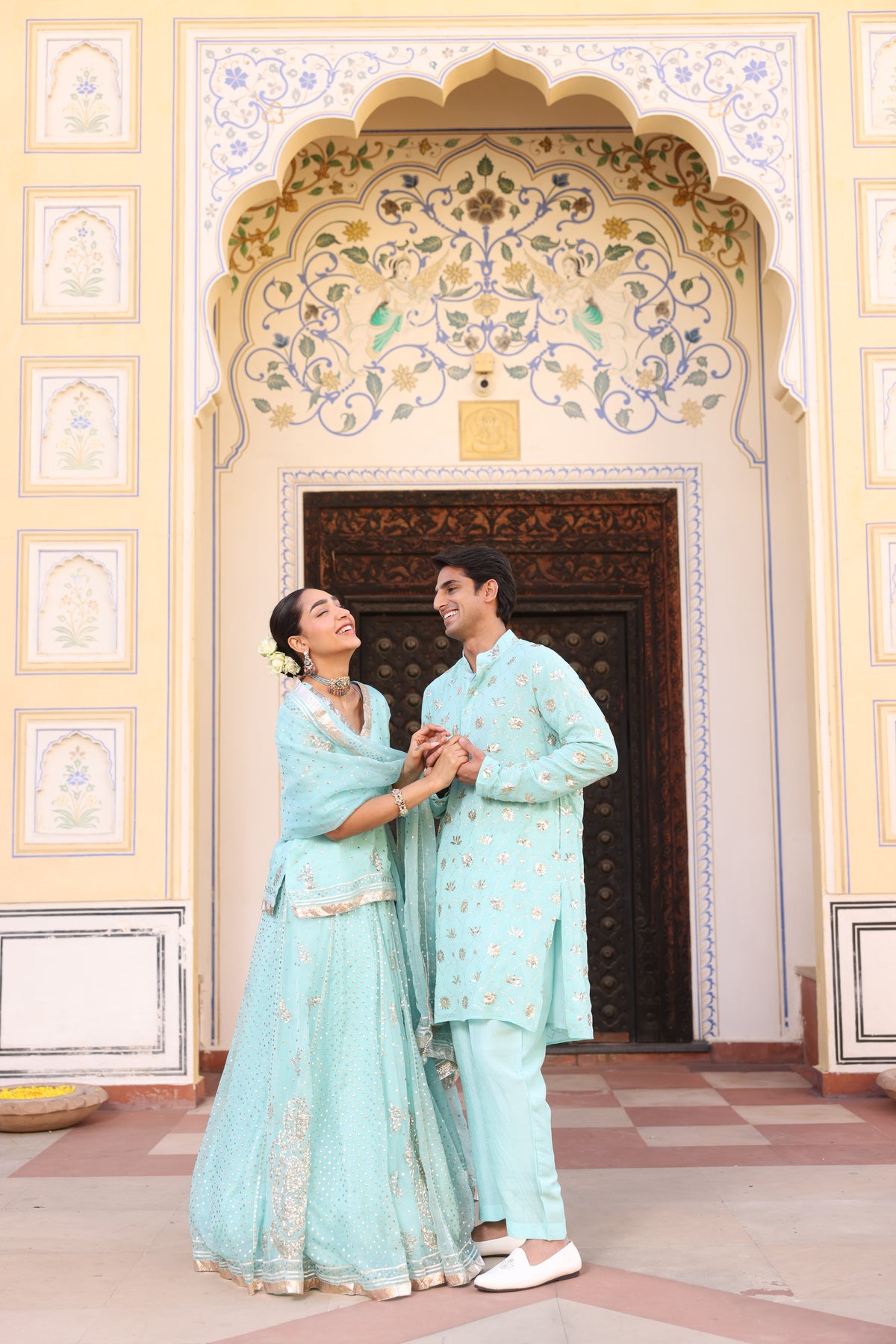 Ice Blue Couple Wear – Organza Lehenga & Men's Kurta Set with Traditional Mukesh Work