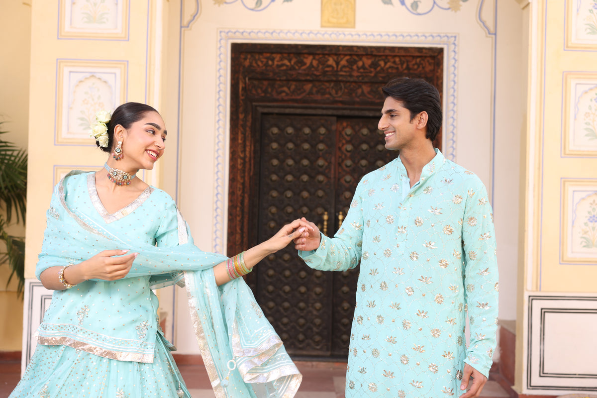 Ice Blue Couple Wear – Organza Lehenga & Men's Kurta Set with Traditional Mukesh Work